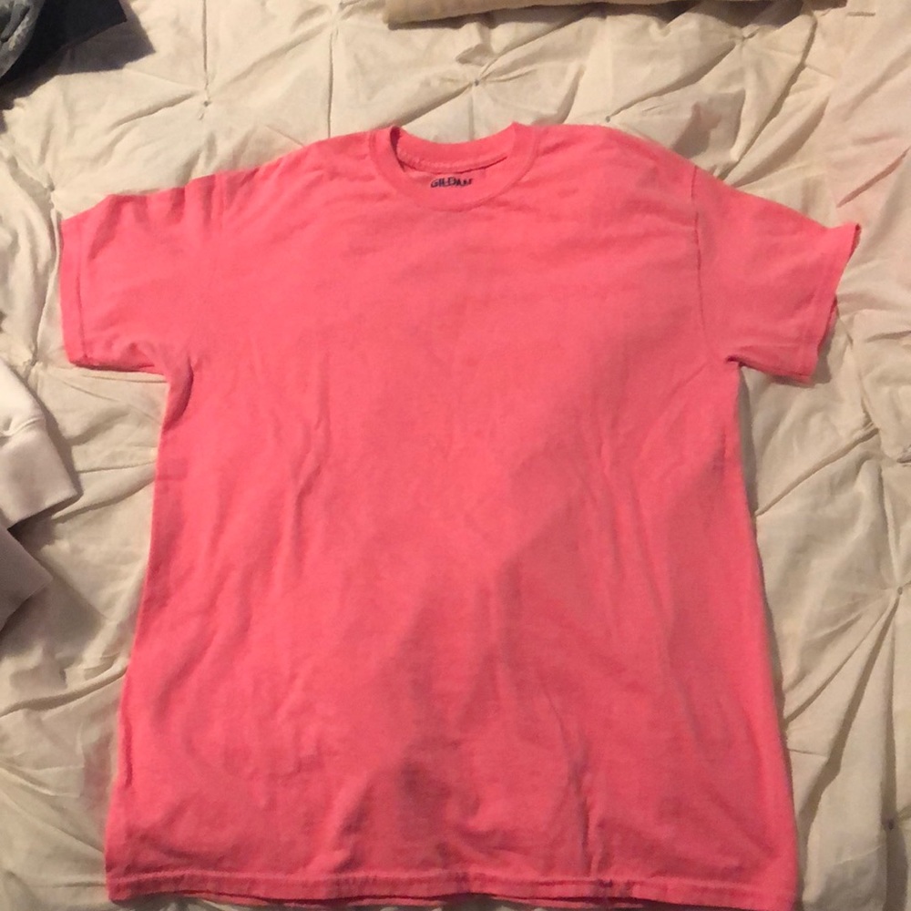 a cute pink t-shirt. never been worn.